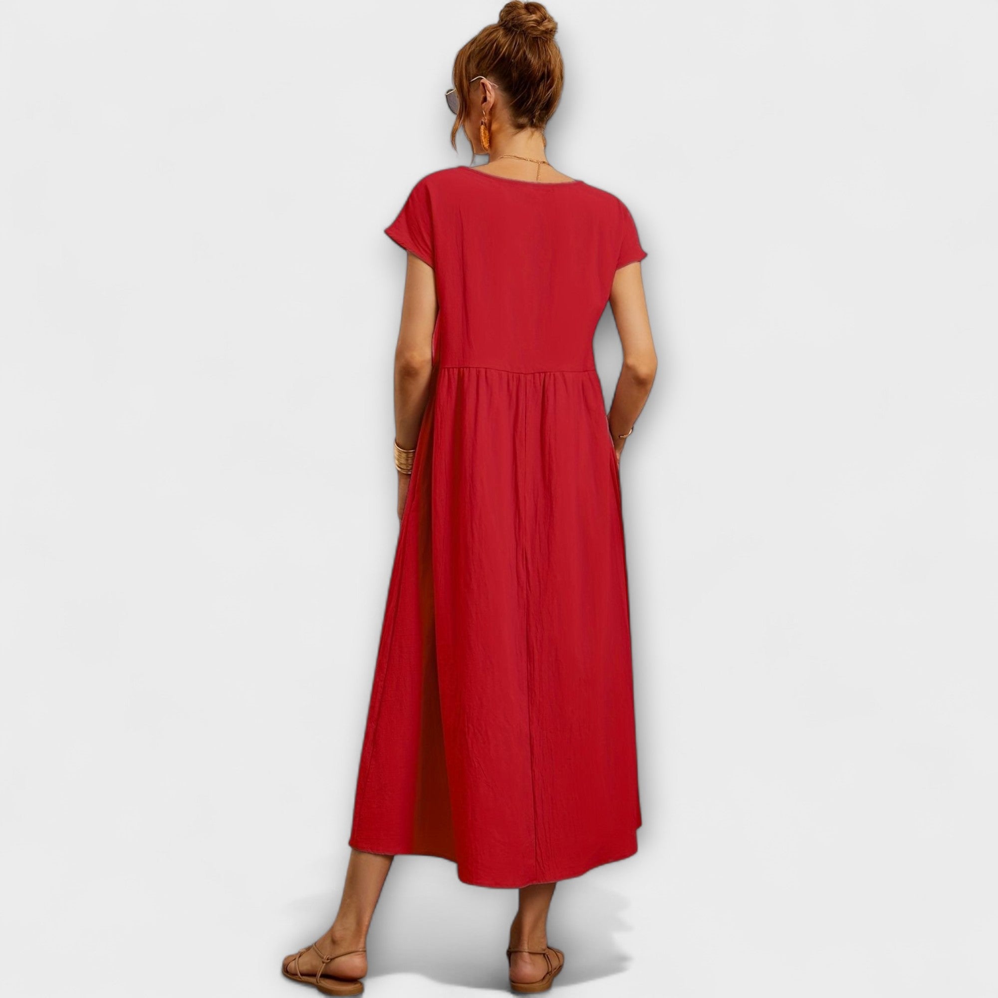 Rochie midi cu linie simplă și buzunare laterale