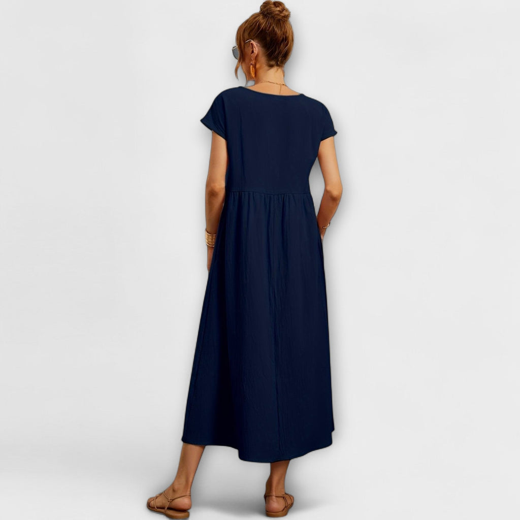 Rochie midi cu linie simplă și buzunare laterale