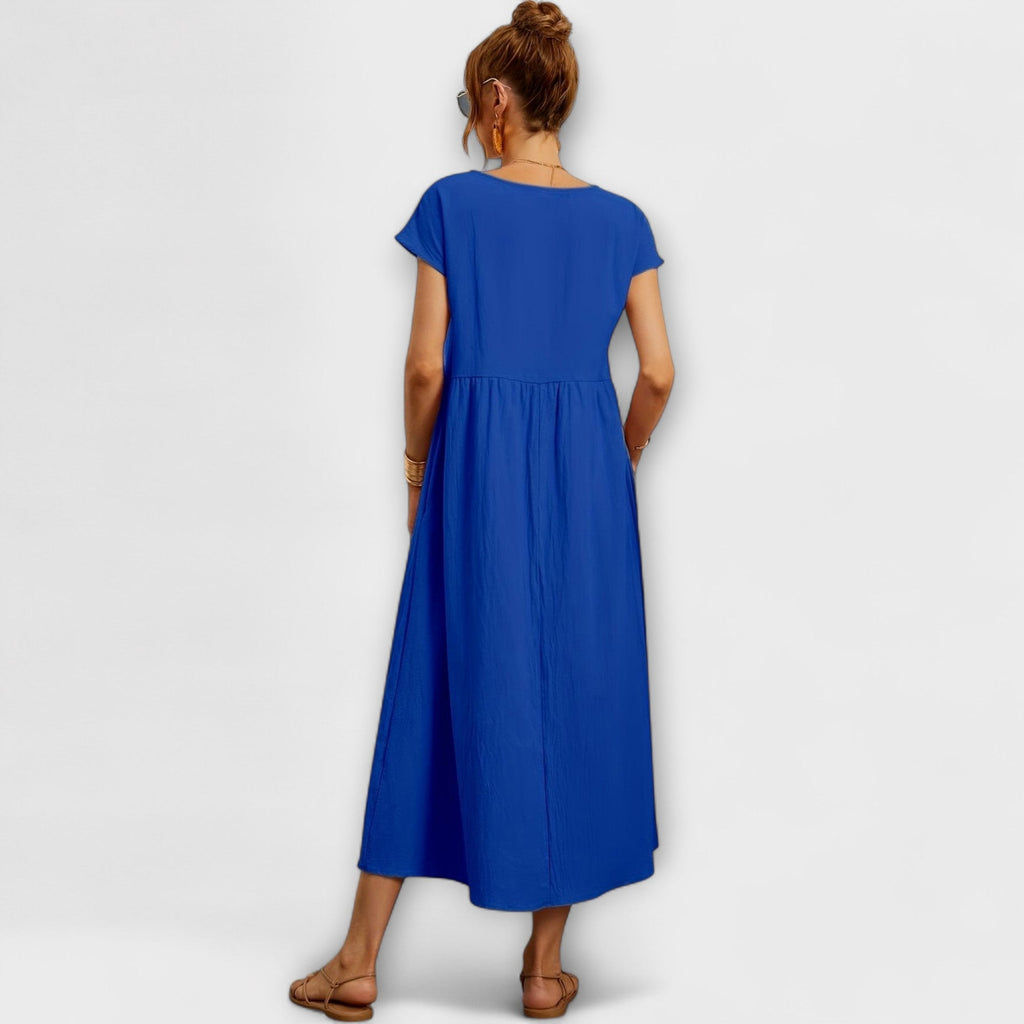 Rochie midi cu linie simplă și buzunare laterale
