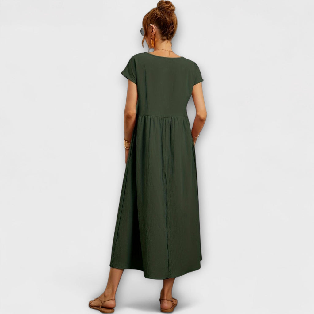 Rochie midi cu linie simplă și buzunare laterale