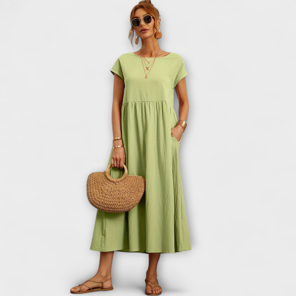 Rochie midi cu linie simplă și buzunare laterale