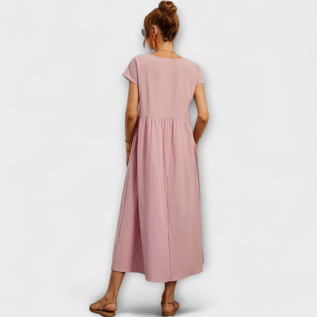 Rochie midi cu linie simplă și buzunare laterale