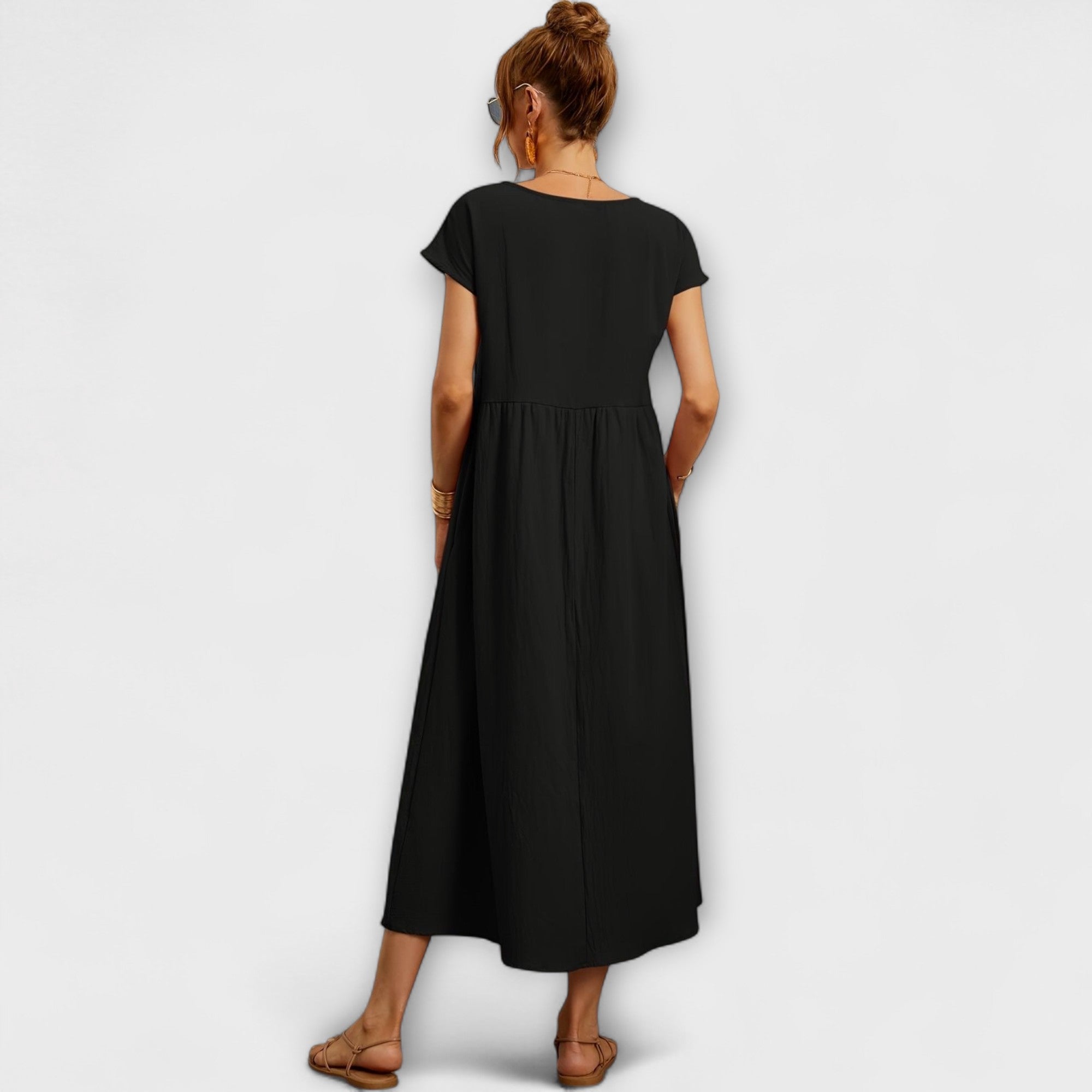 Rochie midi cu linie simplă și buzunare laterale