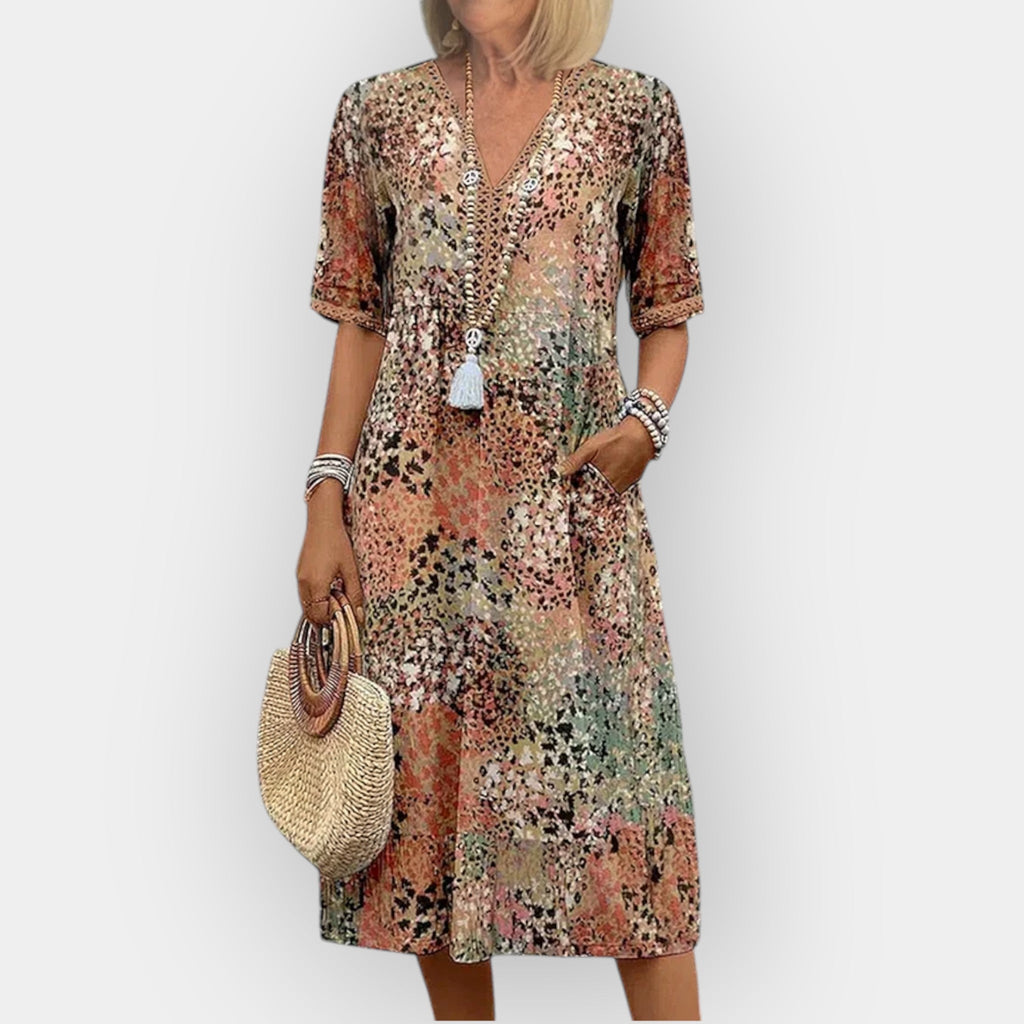 Rochie midi cu imprimeu floral și stil