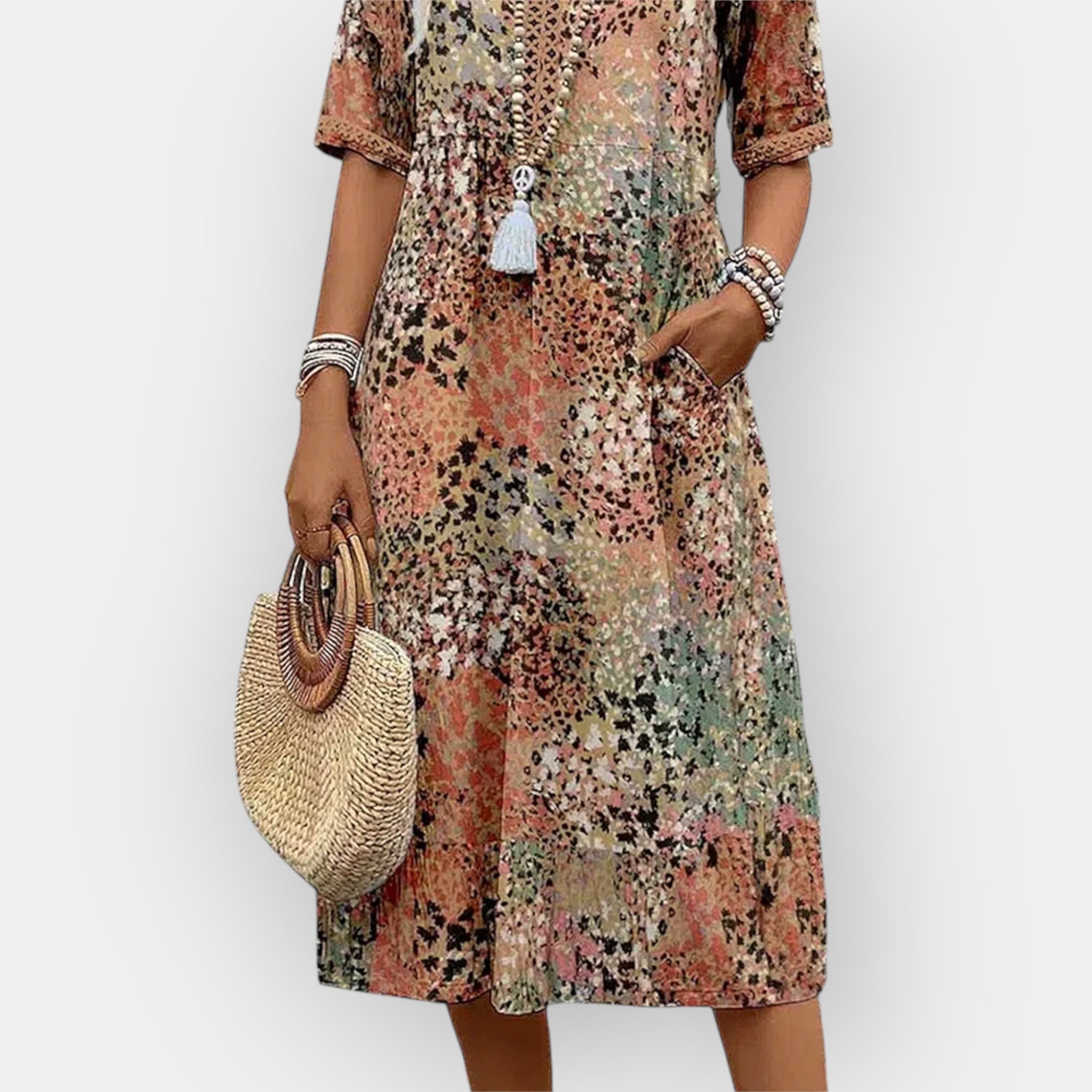 Rochie midi cu imprimeu floral și stil